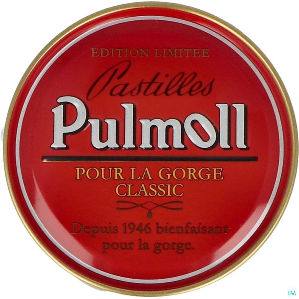 Boîte ronde rouge avec bord doré. Inscription: Pulmoll Pastilles, Classic, Pour la Gorge. Depuis 1946.