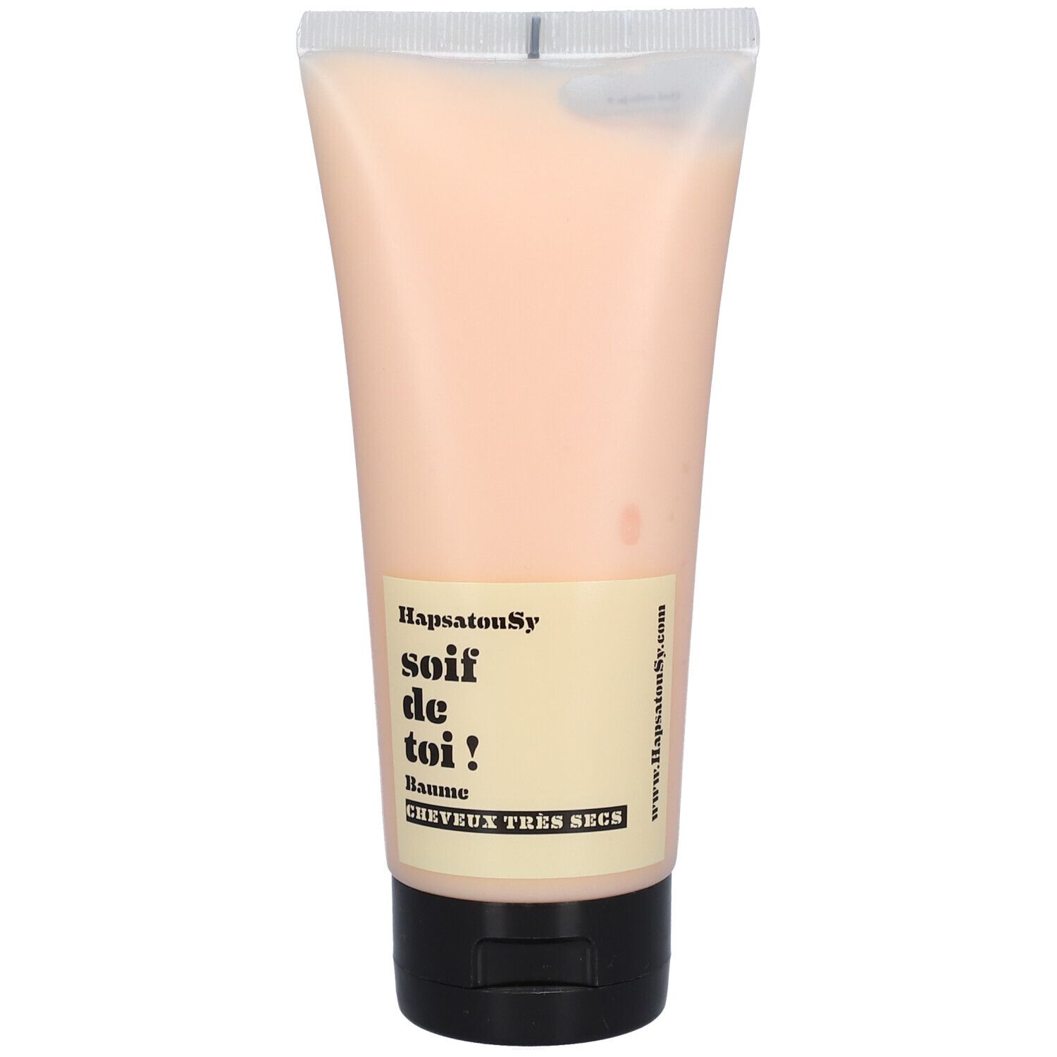 Tube de crème translucide. Texte: HapsatouSy, soif de toi !, Baume, Cheveux très secs. Bouchon noir.