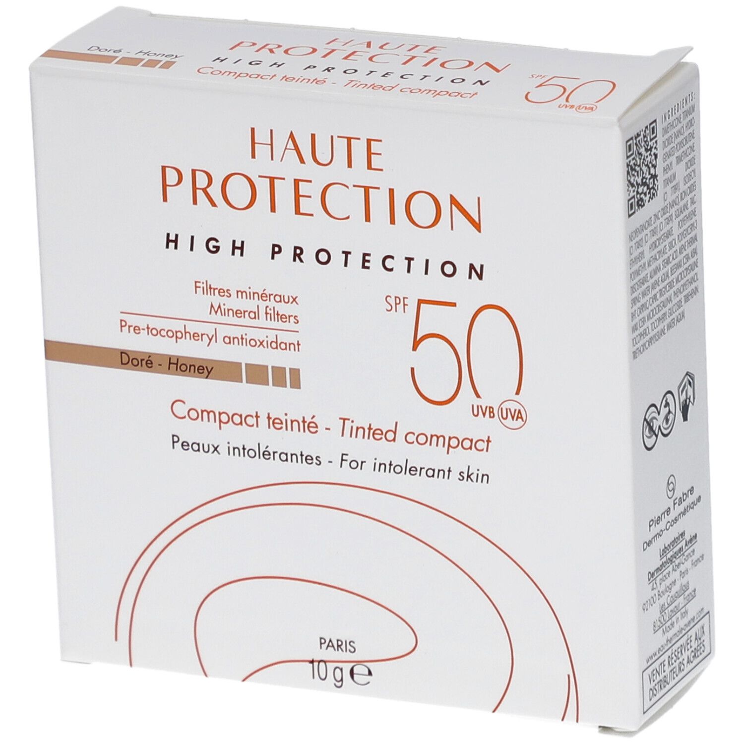 Boîte blanche avec informations produit. Texte: Haute Protection, SPF 50, Compact teinté, Doré-Honey. 10g.