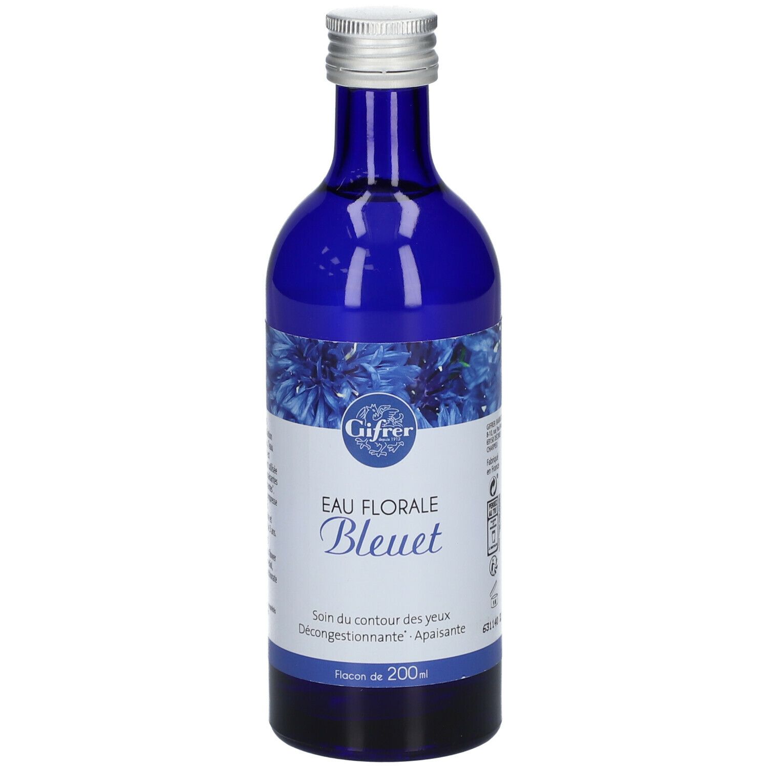Flacon bleu en verre, bouchon argenté. Étiquette avec nom et logo du produit. Texte: Eau Florale Bleuet. Contenance 200 ml.