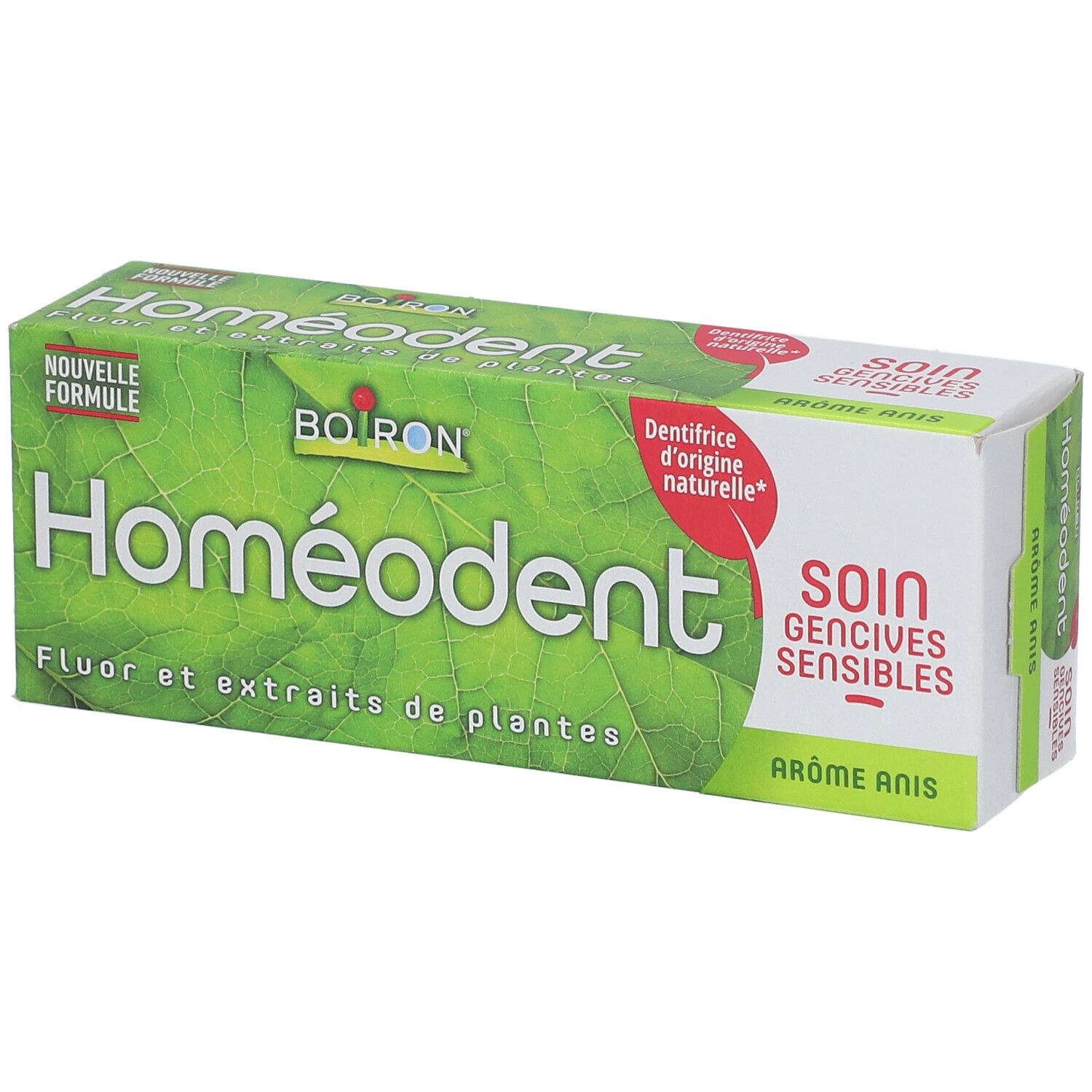 Boîte de dentifrice Homeodent. Vert avec logo Boiron. Inscription 'Fluor et extraits de plantes'. Arôme Anis.