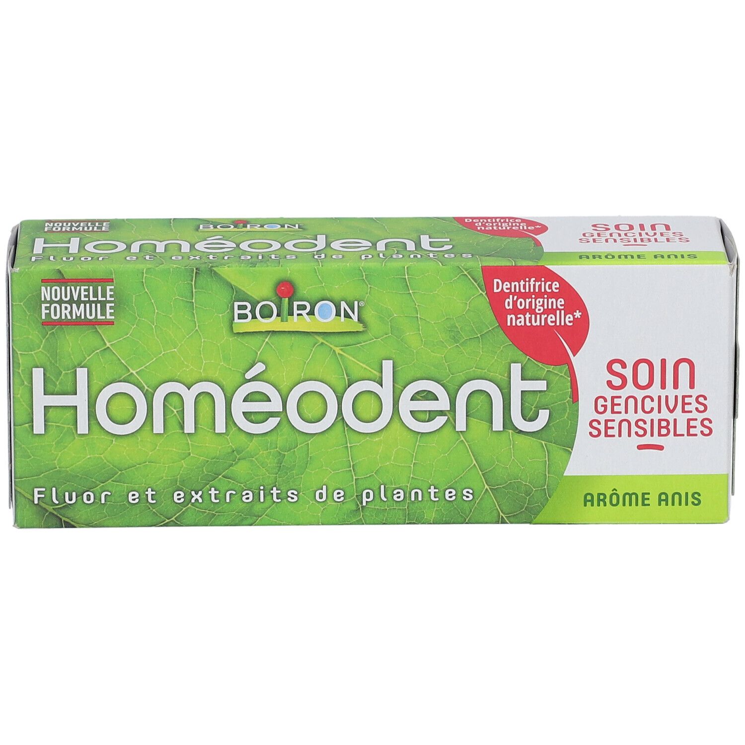 Boîte de dentifrice Homeodent. Vert avec logo Boiron. Inscription 'Fluor et extraits de plantes'. Arôme Anis.