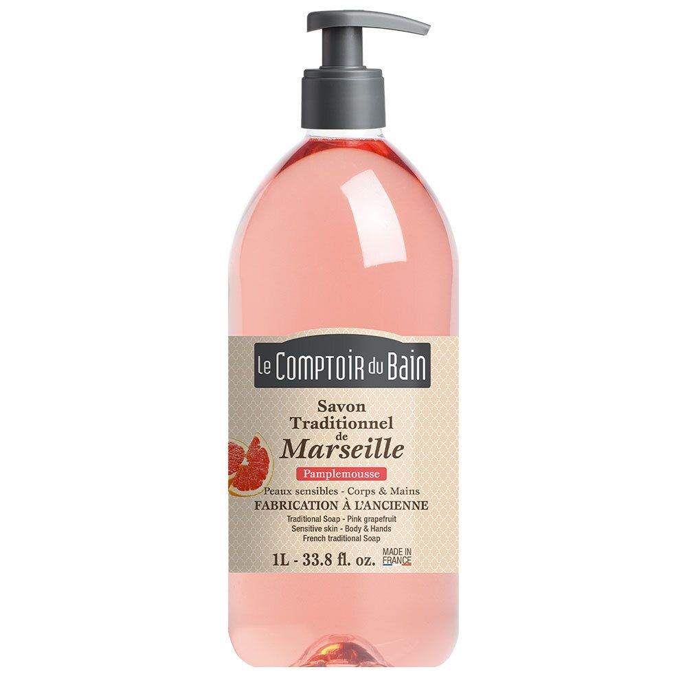 Savon pamplemousse rose en flacon transparent avec pompe. Étiquette avec informations et logo.