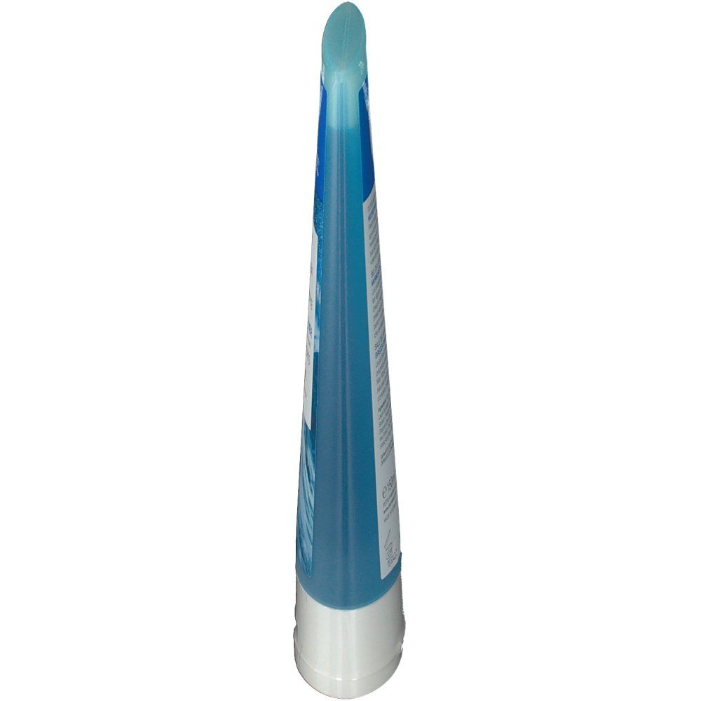 Tube bleu fin, base blanche. Arrondi en haut. Face avant avec motif vagues.