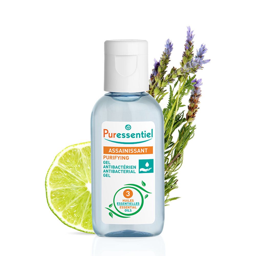 Flacon transparent avec bouchon blanc, à côté de lavande et tranche de citron vert. Étiquette avec texte: Assainissant, Purifying Gel, Antibacterial Gel.