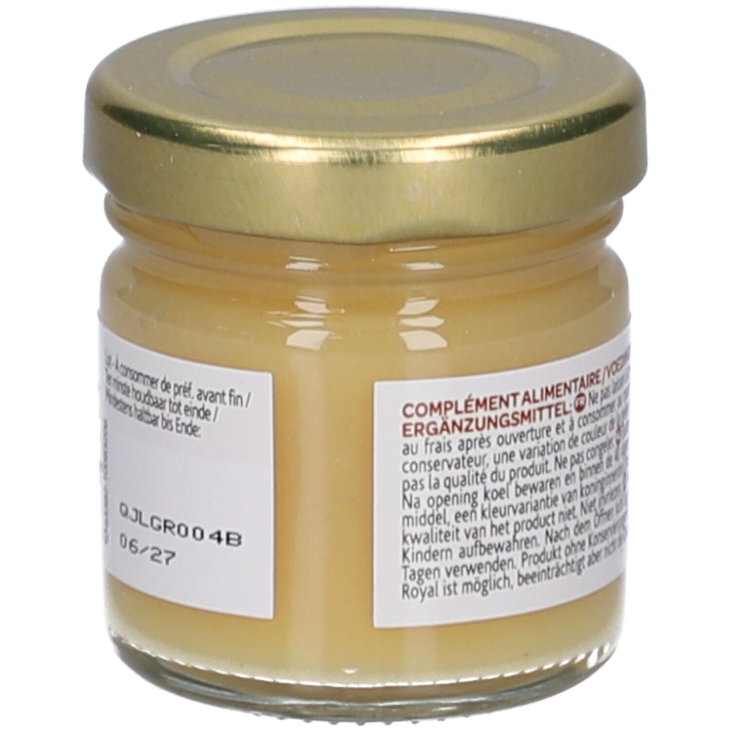 Pot en verre avec couvercle doré. Contient un liquide jaunâtre. Inscription: Arkoroyal, 100% Gelée Royale.
