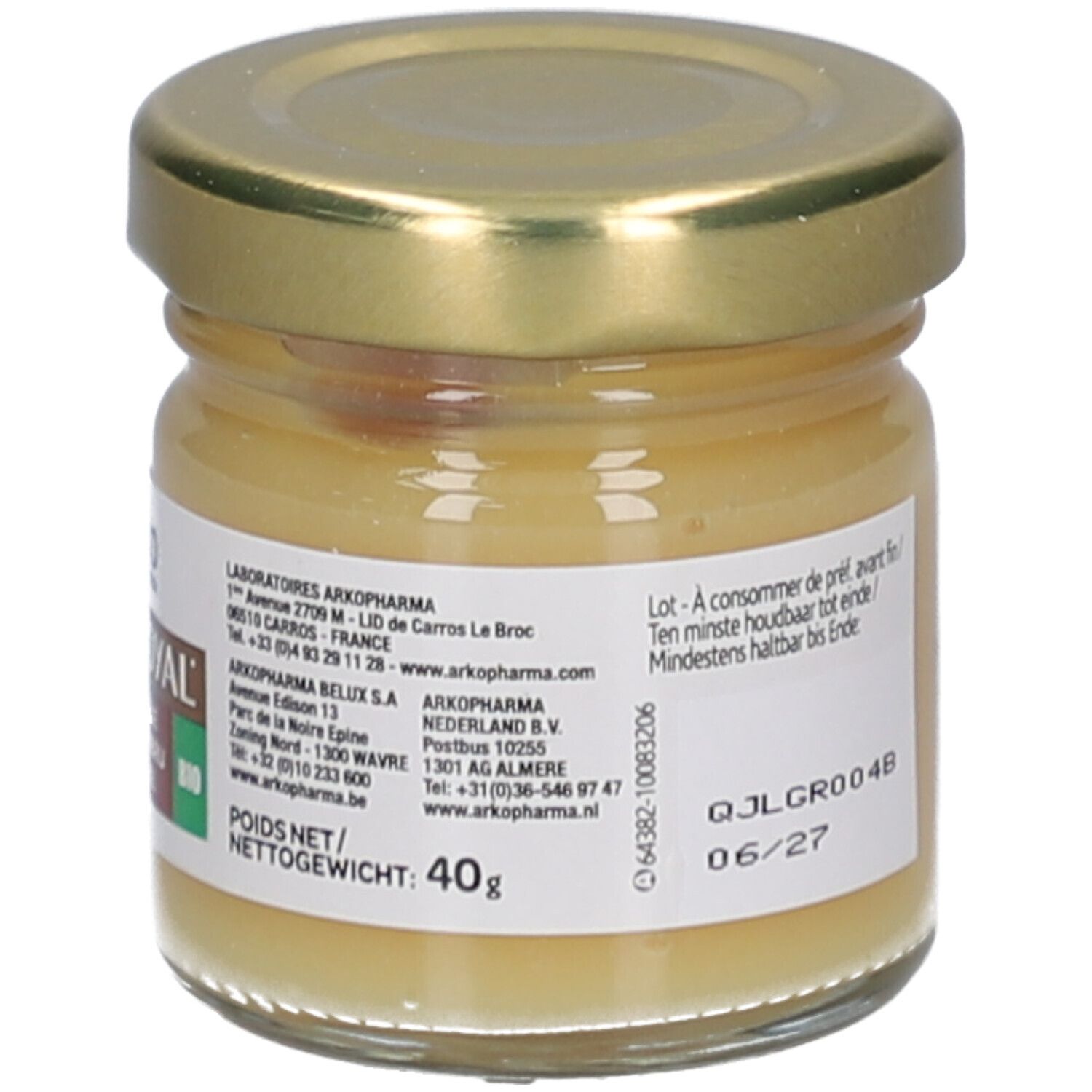 Pot en verre avec couvercle doré. Contient un liquide jaunâtre. Inscription: Arkoroyal, 100% Gelée Royale.