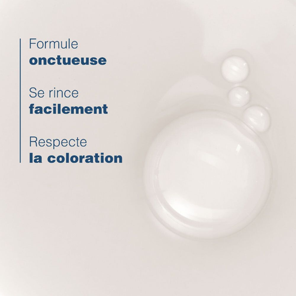 Gros plan sur liquide. Texte: Formule onctueuse. Se rince facilement. Respecte la coloration.