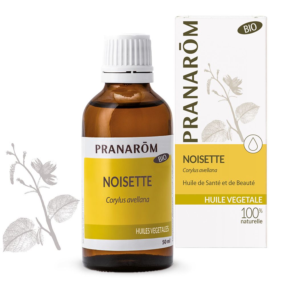 Huile végétale Pranarom Noisette: Flacon en verre brun, bouchon blanc, et sa boîte. Logo BIO et illustration botanique.