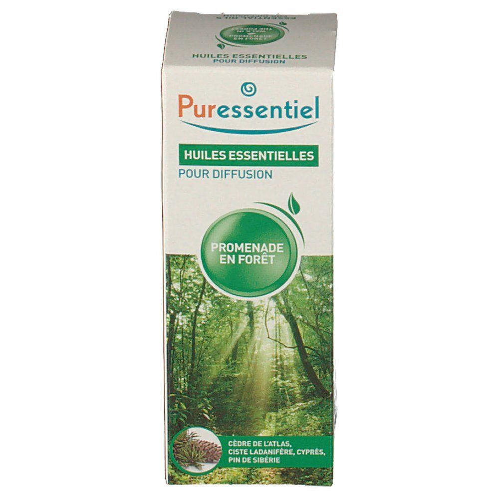 Emballage en carton. Inscription: Puressentiel, Huiles essentielles pour diffusion, Promenade en forêt. Motif forêt et ingrédients.