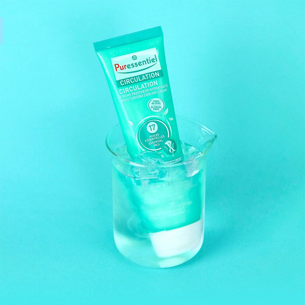 Tube turquoise dans un verre d'eau. Inscription : Puressentiel Circulation. Contient 17 huiles essentielles. Sans alcool.
