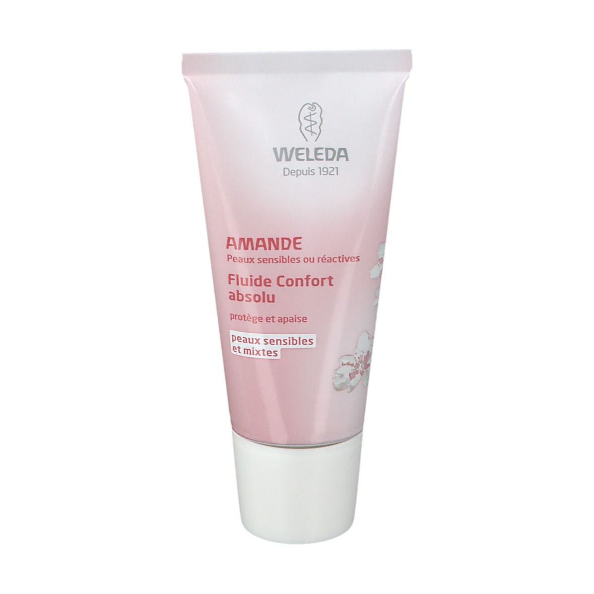 Tube rose avec bouchon blanc. Inscription : Weleda, Amande, Fluide Confort absolu. Pour peaux sensibles et mixtes.