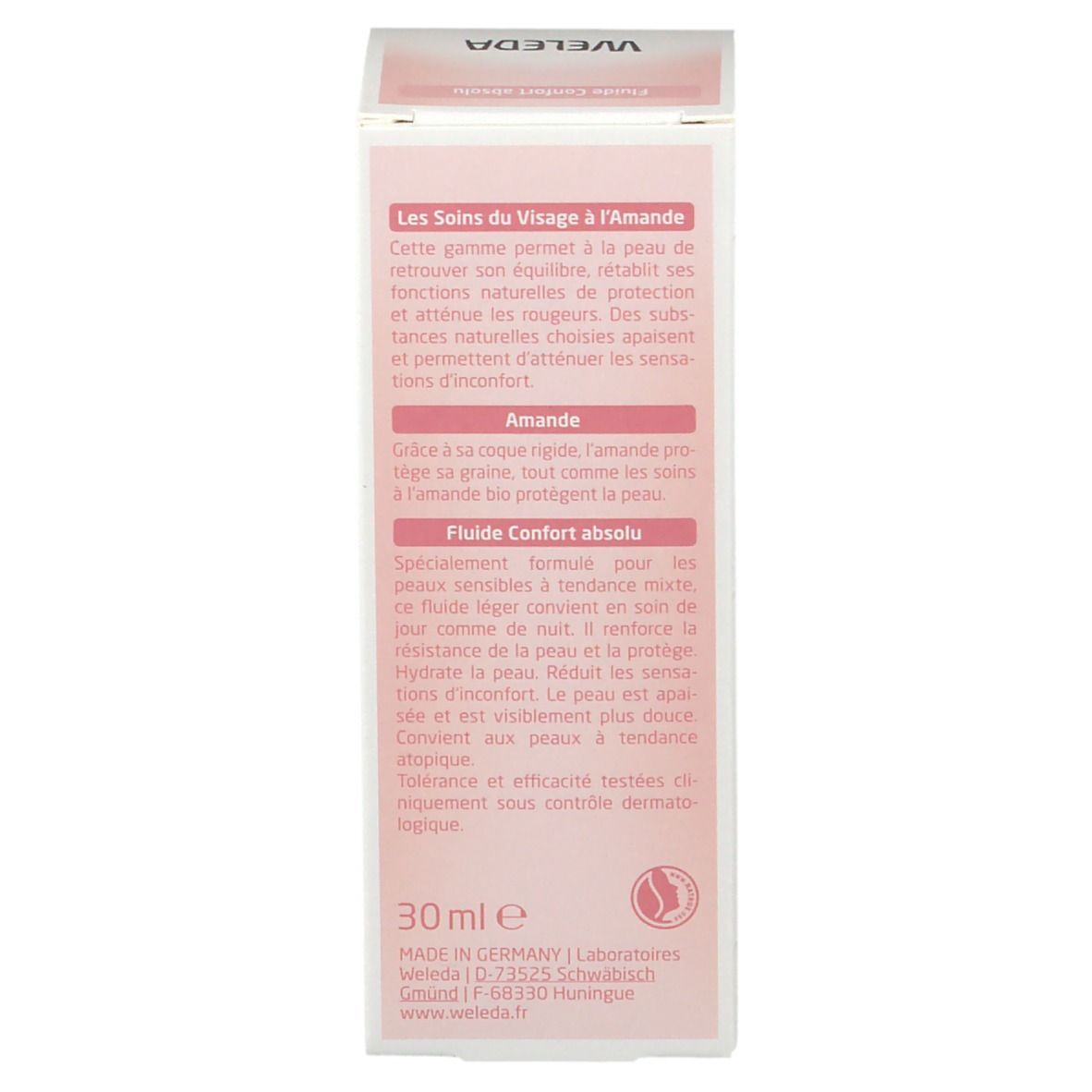 Emballage carton. Texte : Soins du visage à l'amande. Fluide Confort absolu. 30 ml. Testé dermatologiquement.