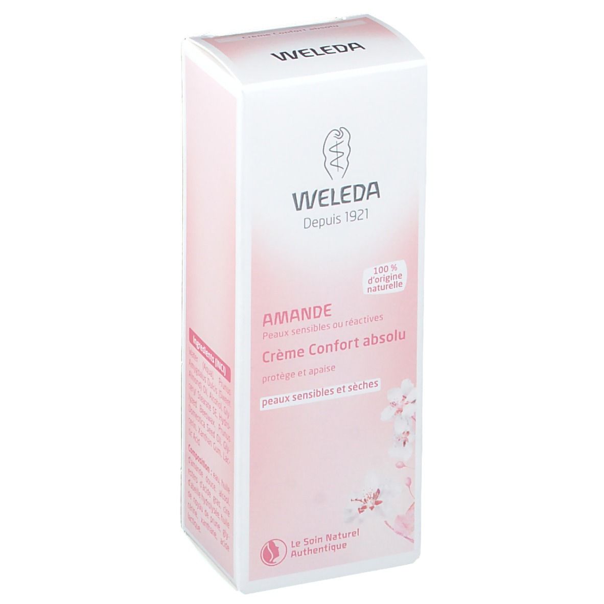 Boîte Weleda Crème Confort absolu. Carton blanc et rose avec logo et nom du produit. Texte: Crème Confort absolu, peaux sensibles et sèches.