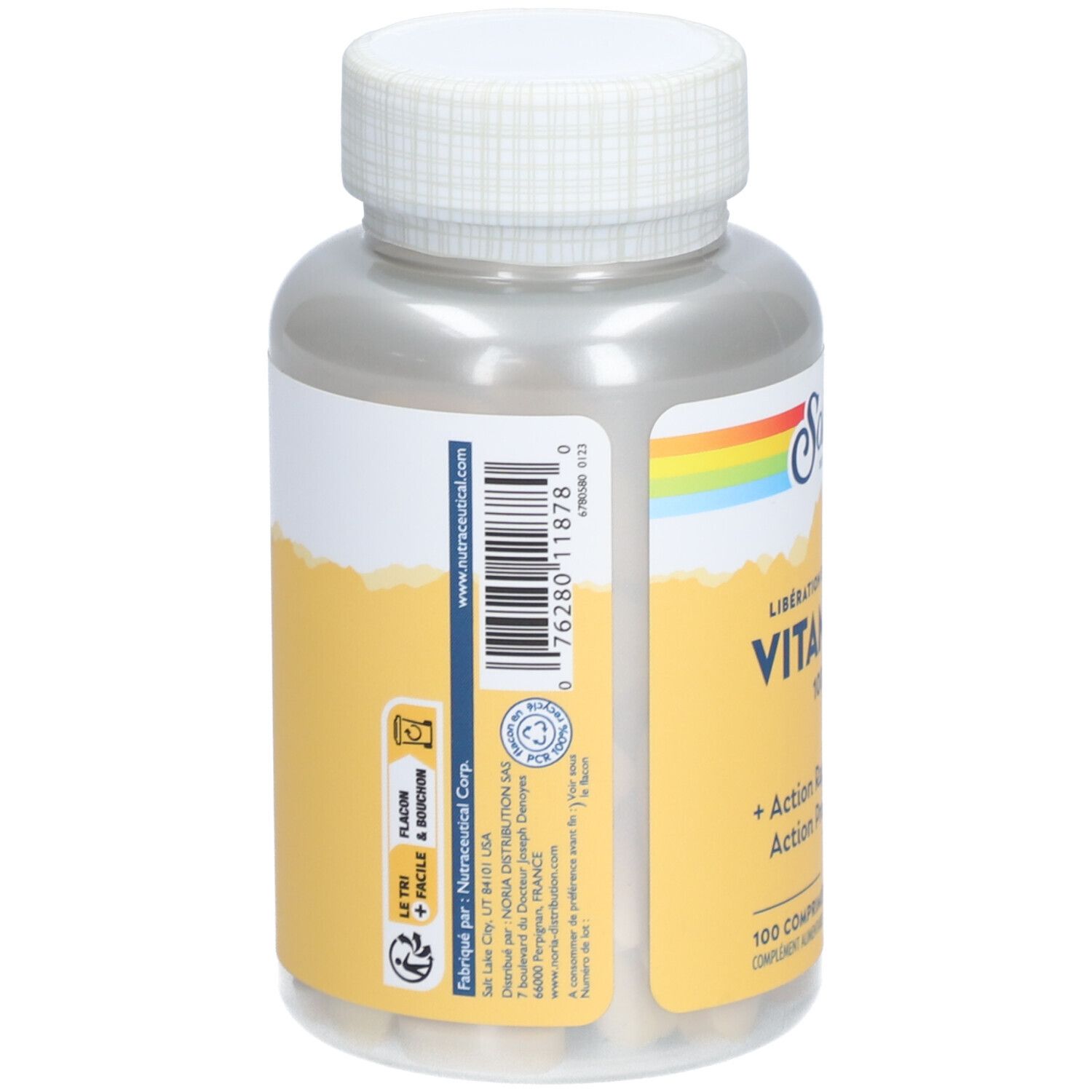 Dos du flacon de vitamine C. Code-barres, informations fabricant et étiquette jaune avec texte.