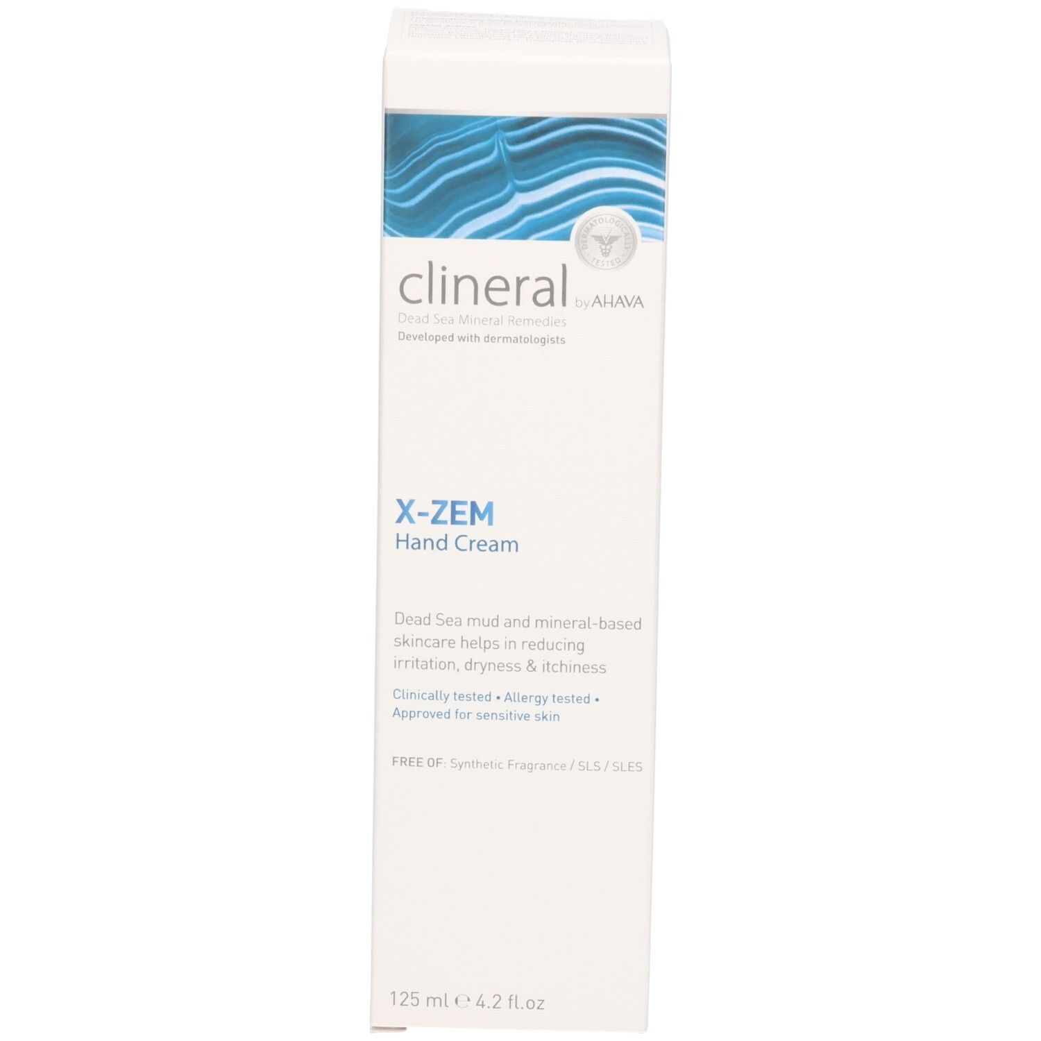 Emballage de la crème pour les mains Clineral X-ZEM. Blanc, vagues bleues. Texte: X-ZEM Hand Cream, Dead Sea Mineral Remedies.