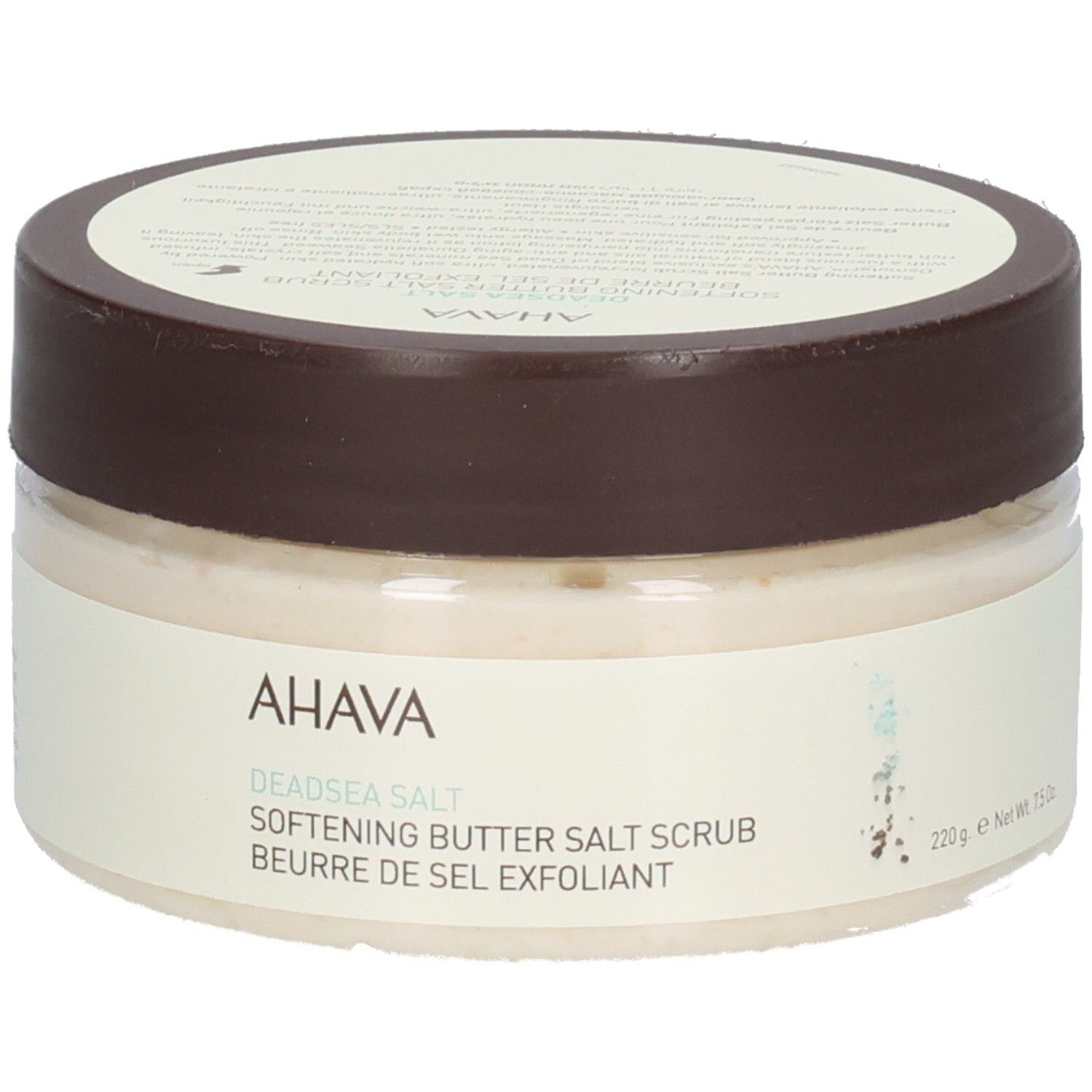 Produit Ahava. Récipient rond transparent avec couvercle marron. Inscription : AHAVA, Deadsea Salt, Softening Butter Salt Scrub, Beurre de Sel Exfoliant, 220g.