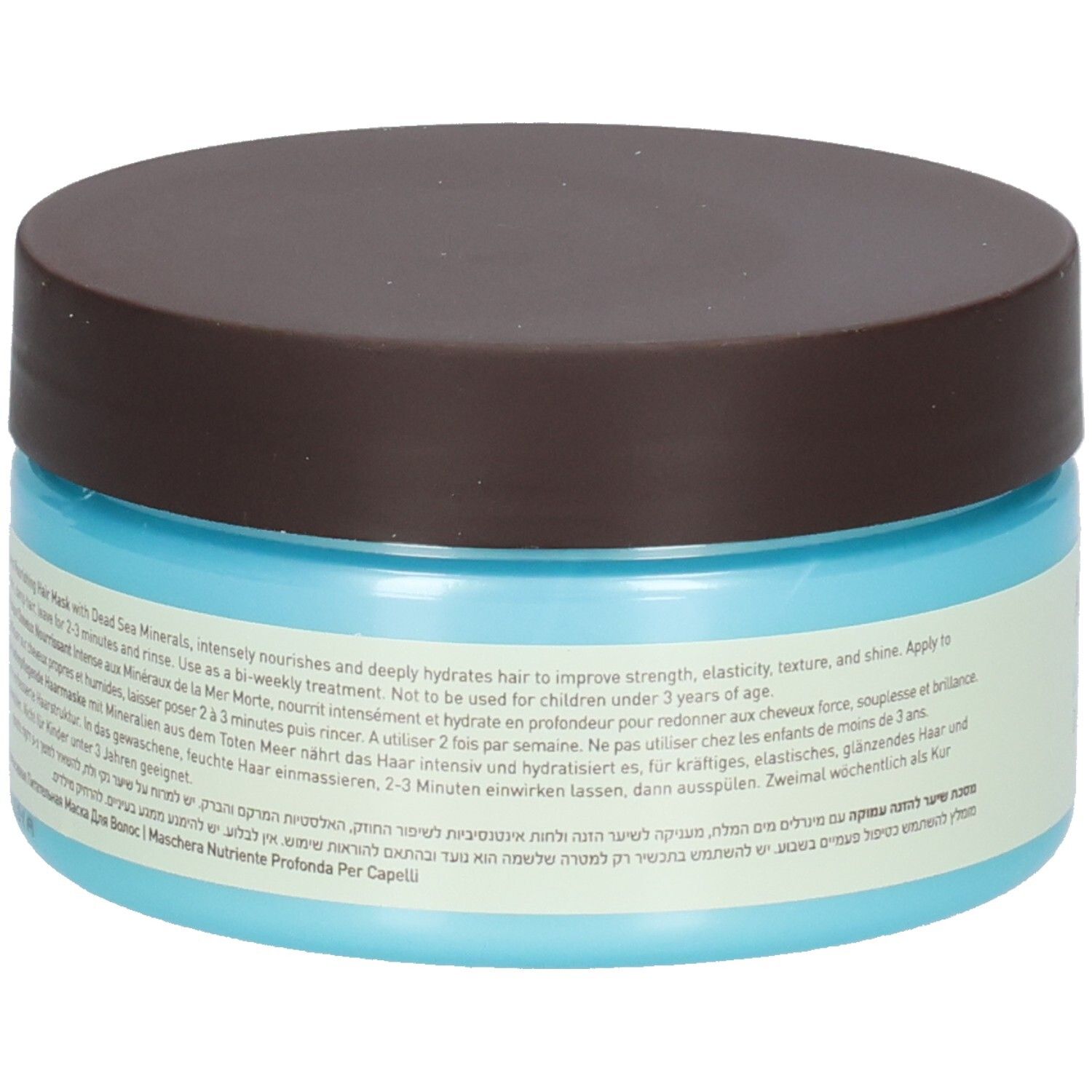 Pot bleu et marron avec couvercle. Texte sur l'étiquette. Informations sur le produit. Masque pour cheveux.