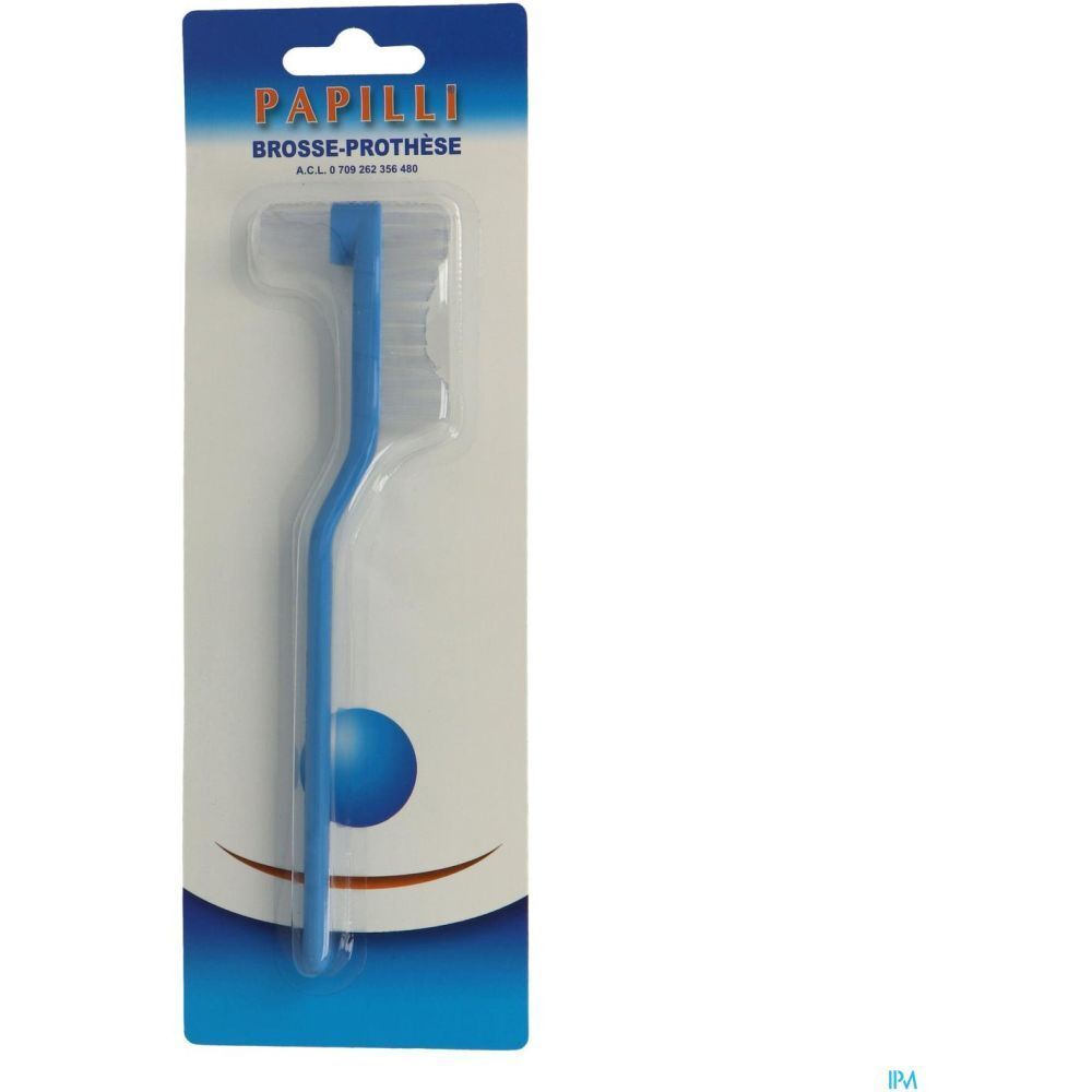 Brosse à prothèse bleue dans son emballage. Forme courbée avec tête et manche. Marque PAPILLI.