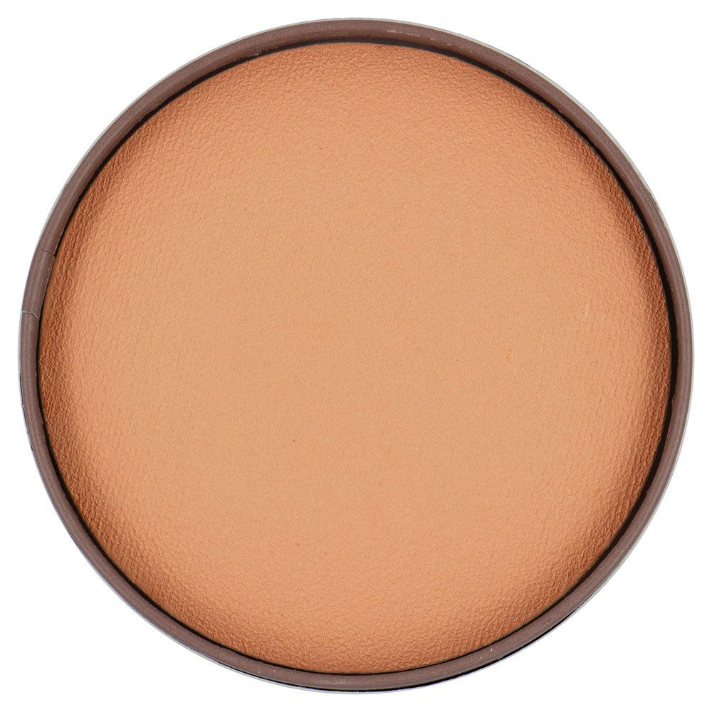 Boîte ronde marron avec poudre bronzée. Bord marron. La poudre a une surface lisse.