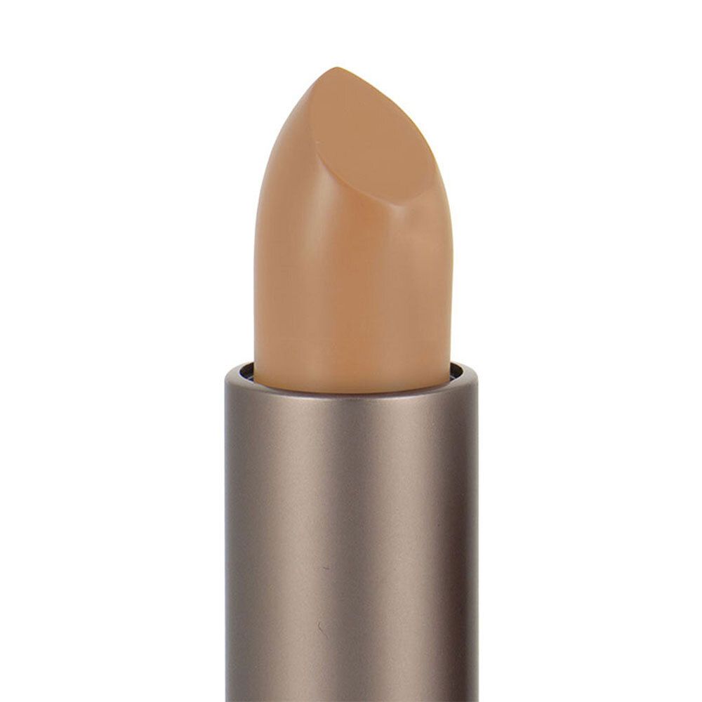 Gros plan sur un correcteur beige. Le bâton est sorti de son étui.