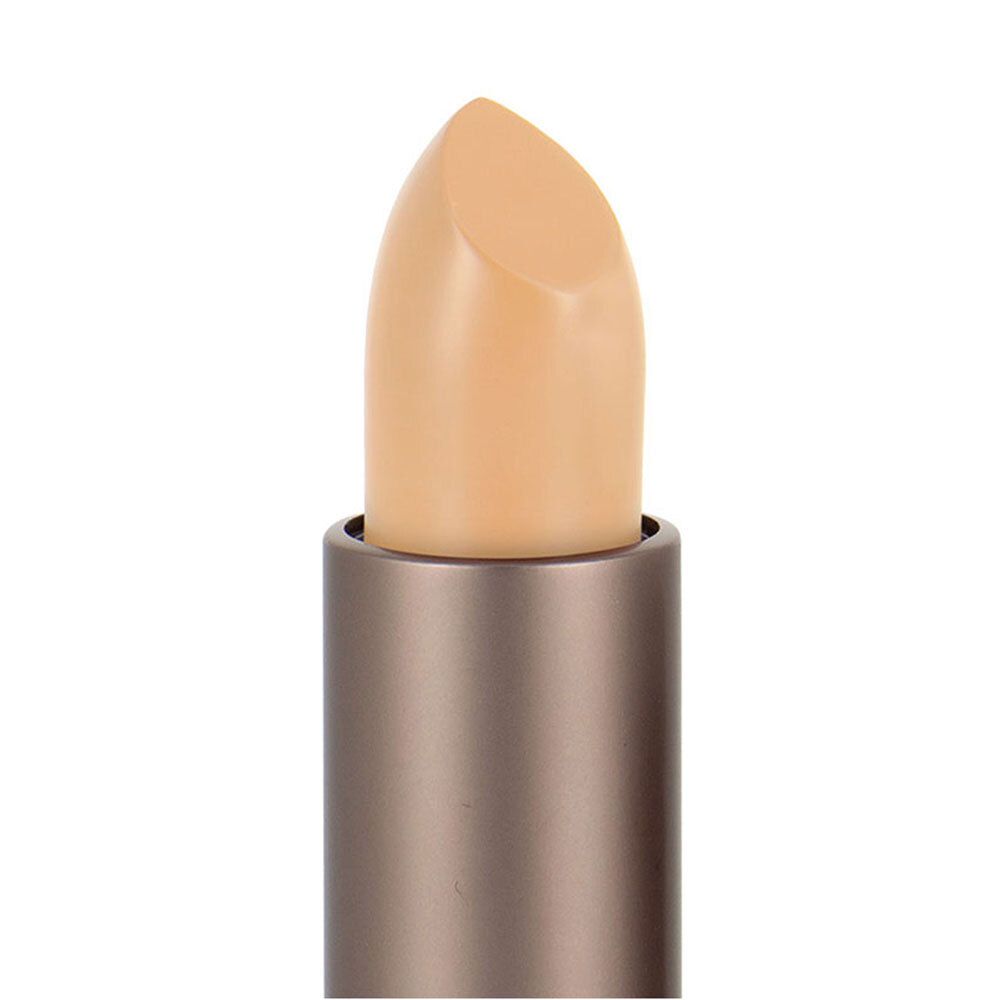 Gros plan sur un correcteur beige. Le bâton est sorti de son étui.