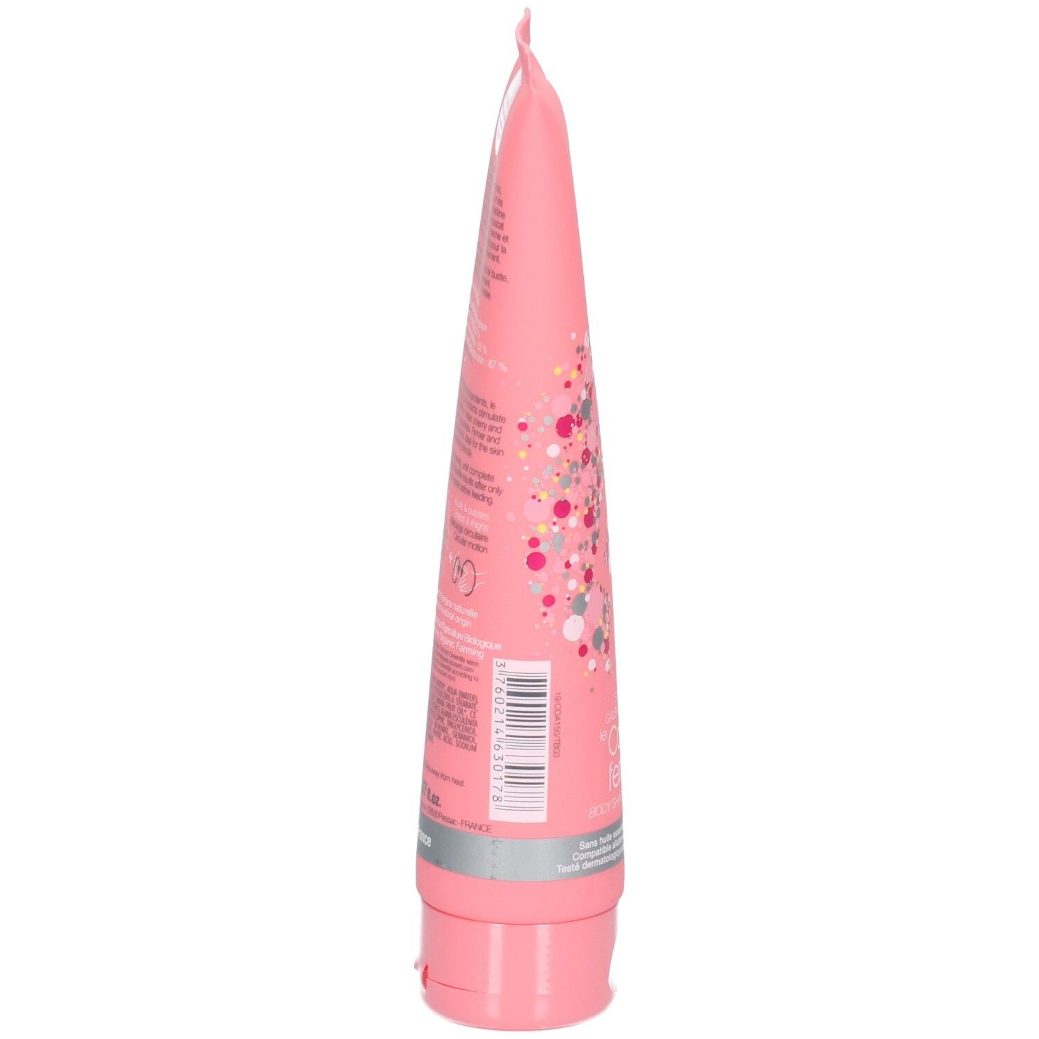 Vue latérale d'un tube rose de soin corps raffermissant Omum avec informations produit.