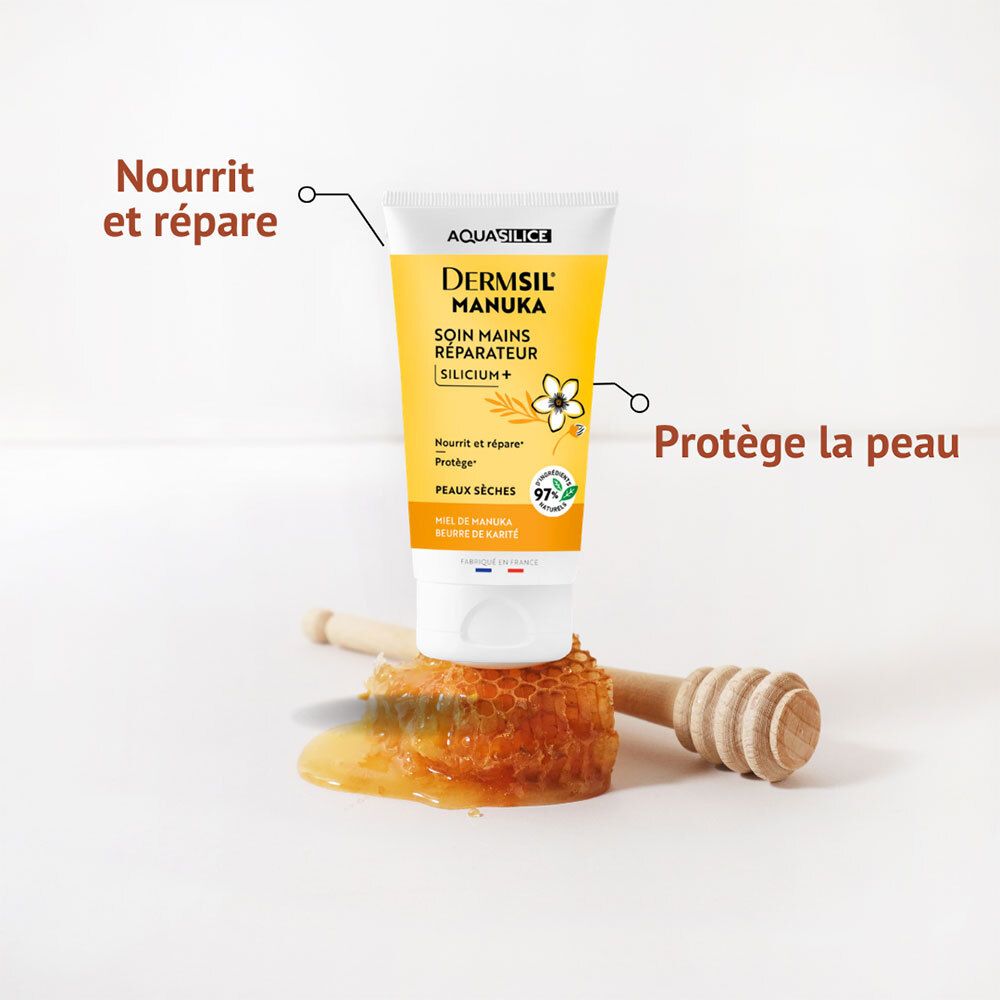 Tube de crème pour les mains Aquasilice Dermsil Manuka à côté d'un nid d'abeilles et d'un miel.