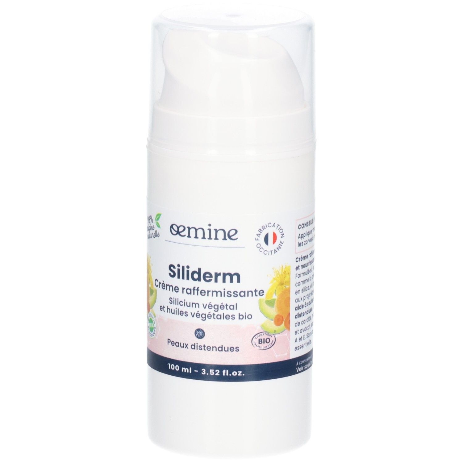 Flacon blanc avec pompe, vue de face. Étiquette avec le nom 'Siliderm', illustrations botaniques et label bio.