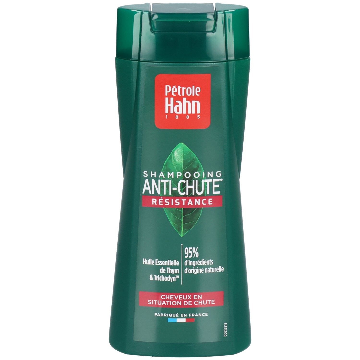 Shampoing Anti-Chute Petrole Hahn: Flacon vert avec étiquette rouge, motif feuille et texte.