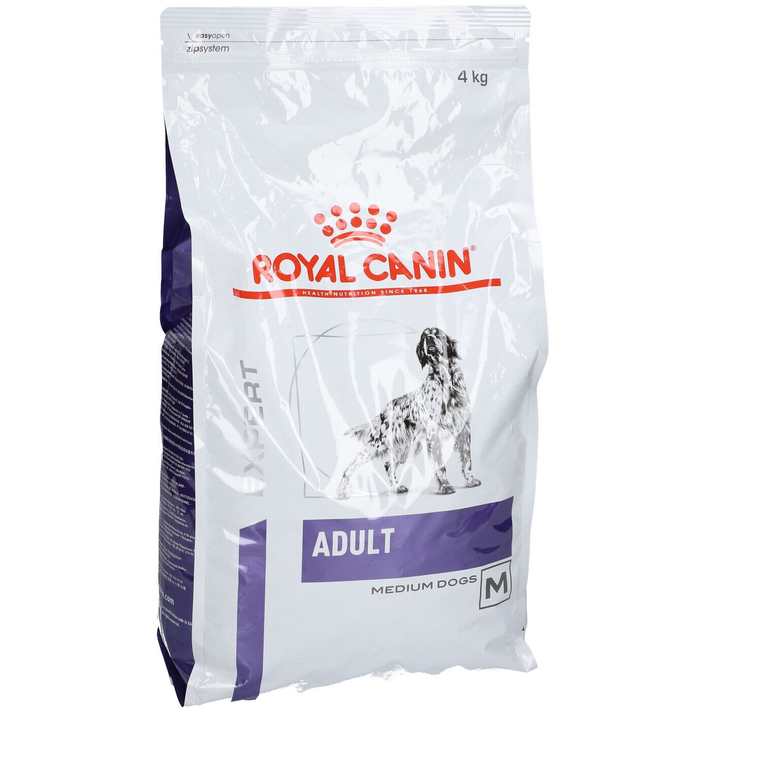 Sac blanc ROYAL CANIN avec logo et image de chien. Inscription: ADULT, MEDIUM DOGS, M. Contient 4 kg.