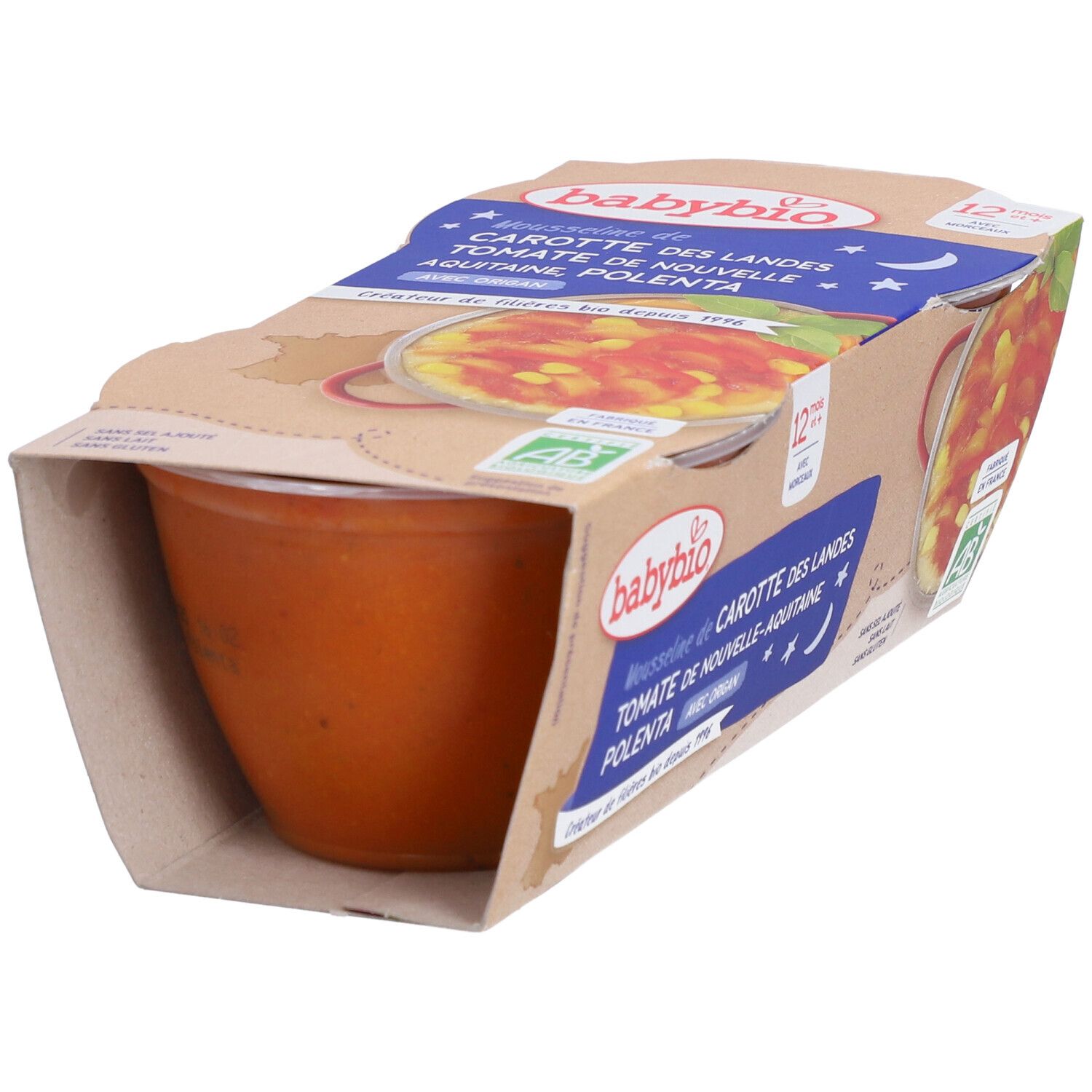 Emballage Babybio Mousse de carottes, tomates et polenta. Un pot et l'emballage avec des informations sur le produit sont visibles.