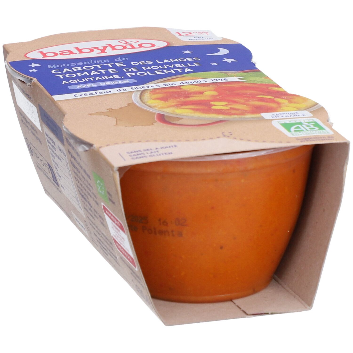 Emballage Babybio Mousse de carottes, tomates et polenta. Le pot est partiellement visible, avec des informations sur le produit.