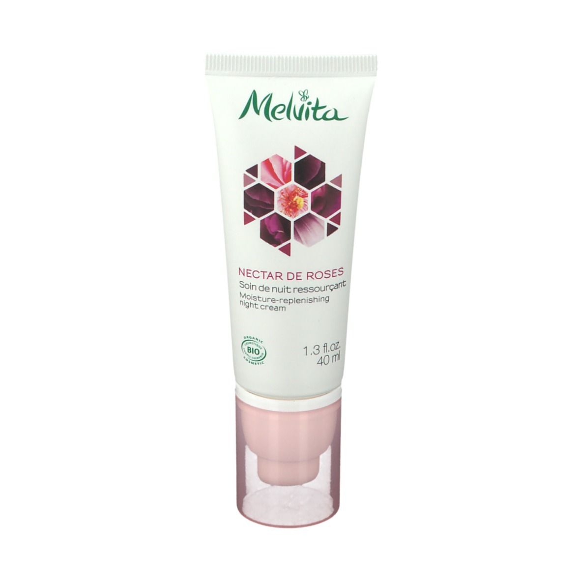 Tube blanc avec bouchon rose. Inscription: Melvita, Nectar de Roses, crème de nuit. Label bio.