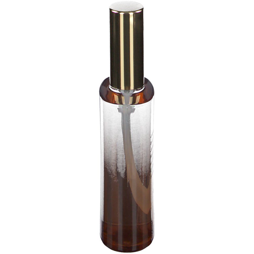 Flacon de parfum cylindrique avec bouchon doré. Dégradé de marron à transparent.