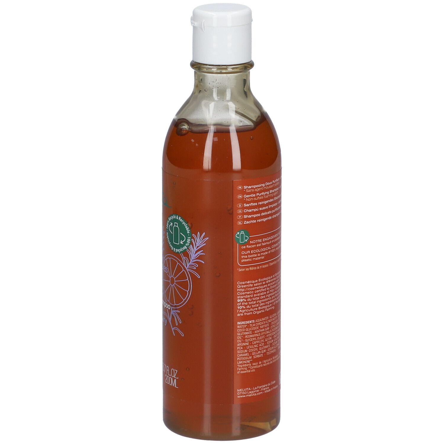 Bouteille transparente avec liquide brun et bouchon blanc. Dos avec texte et logo.