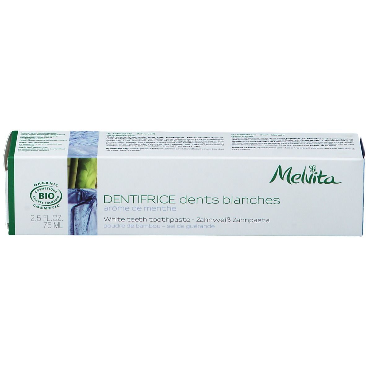 Emballage de dentifrice. Boîte blanche avec accents verts. Logo Melvita et nom du produit.
