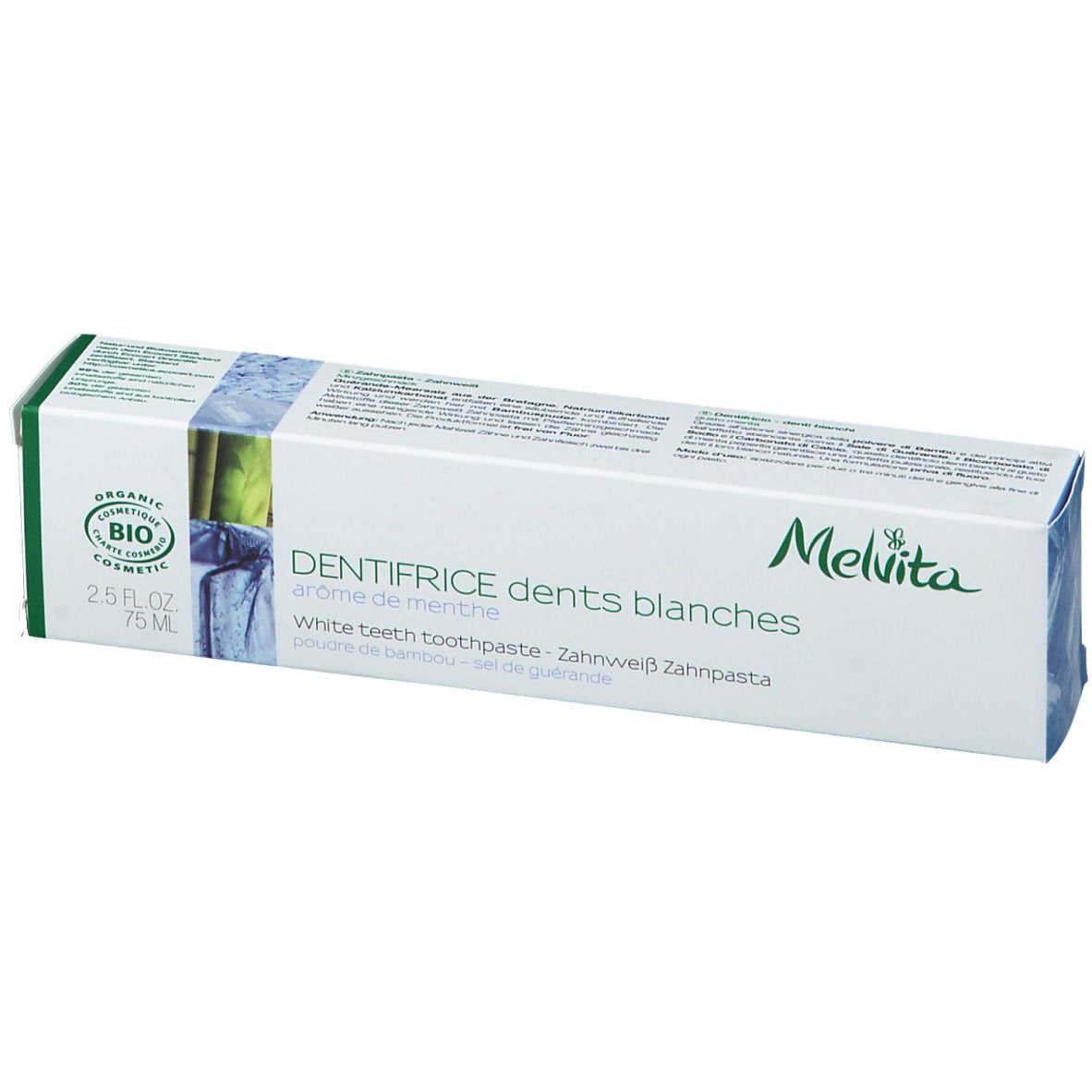 Emballage de dentifrice. Boîte blanche avec accents verts. Logo Melvita et nom du produit.