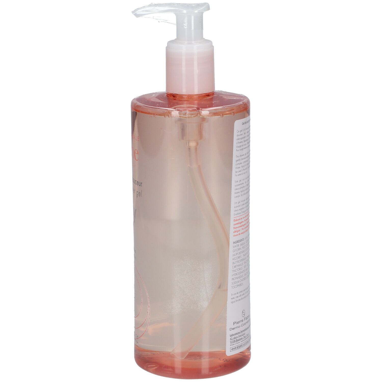 Côté du flacon de gel douche rose. Texte et informations. Liquide transparent visible.