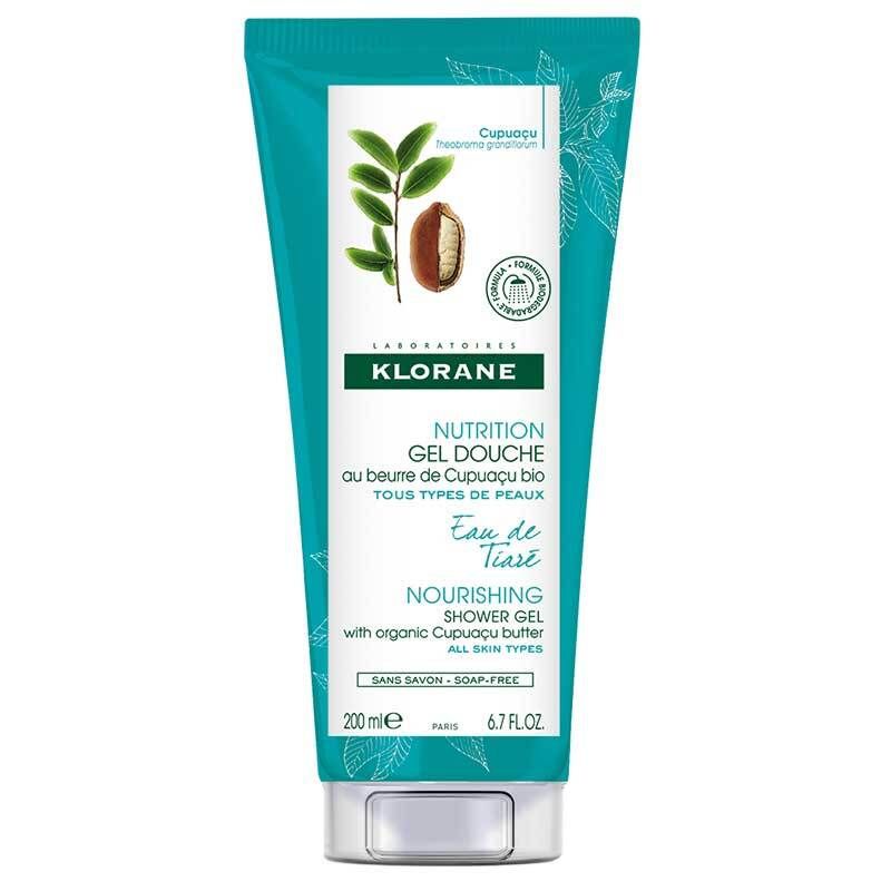 Tube turquoise KLORANE. Inscription "Nutrition Gel Douche". Illustration de fruit et feuilles de Cupuaçu.