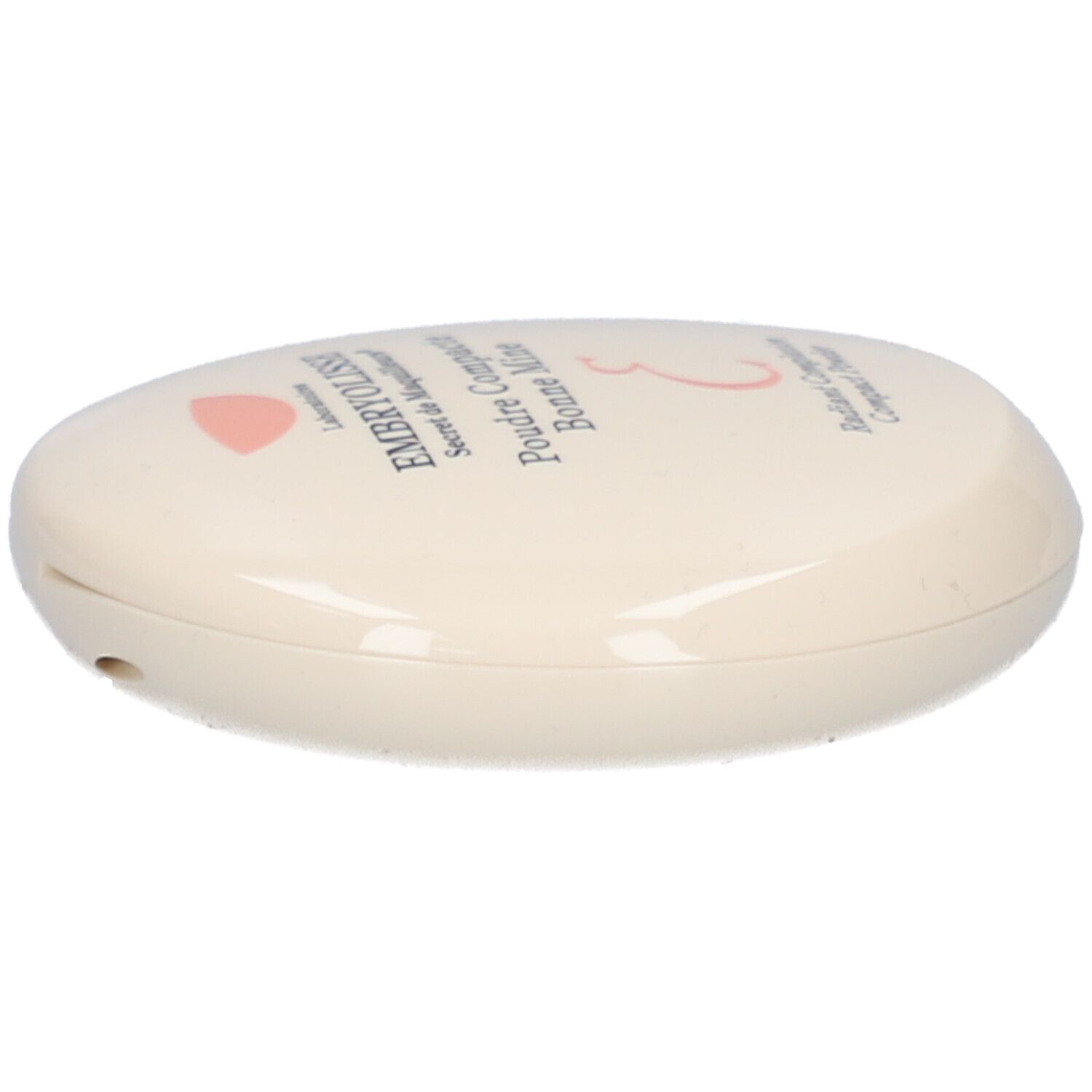 Boîtier de poudre compacte ovale, crème. Inscription: EMBRYOLISSE, Poudre Compacte Bonne Mine. Logo rose.