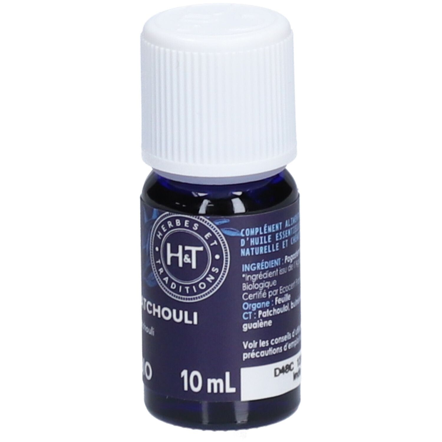 Flacon en verre bleu foncé avec bouchon blanc. Inscription: Patchouli BIO, 10 ml. Marque: H&T.