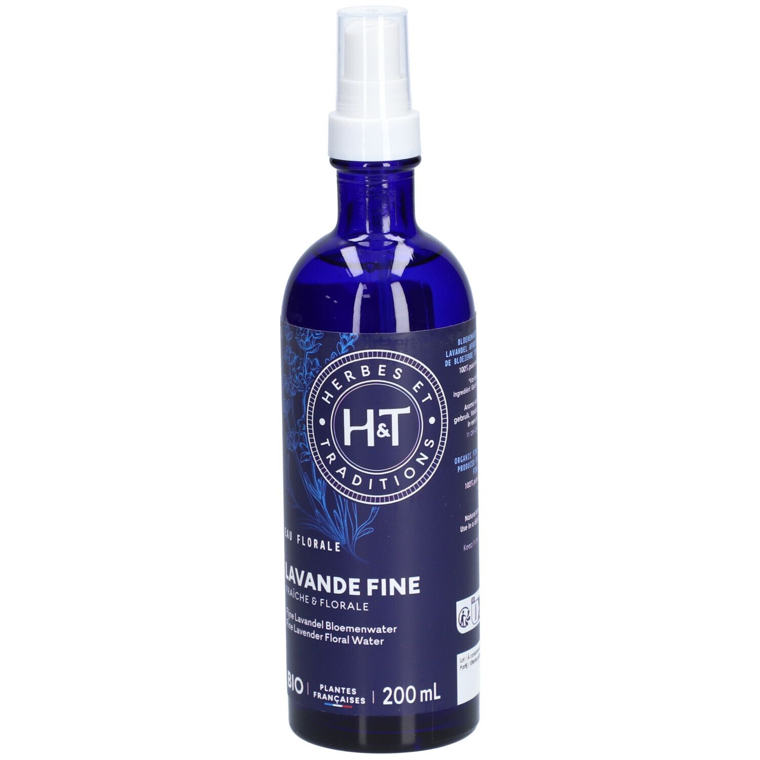 Flacon en verre bleu avec vaporisateur blanc. Inscription: HERBES ET TRADITIONS, LAVANDE FINE BIO. 200ml.
