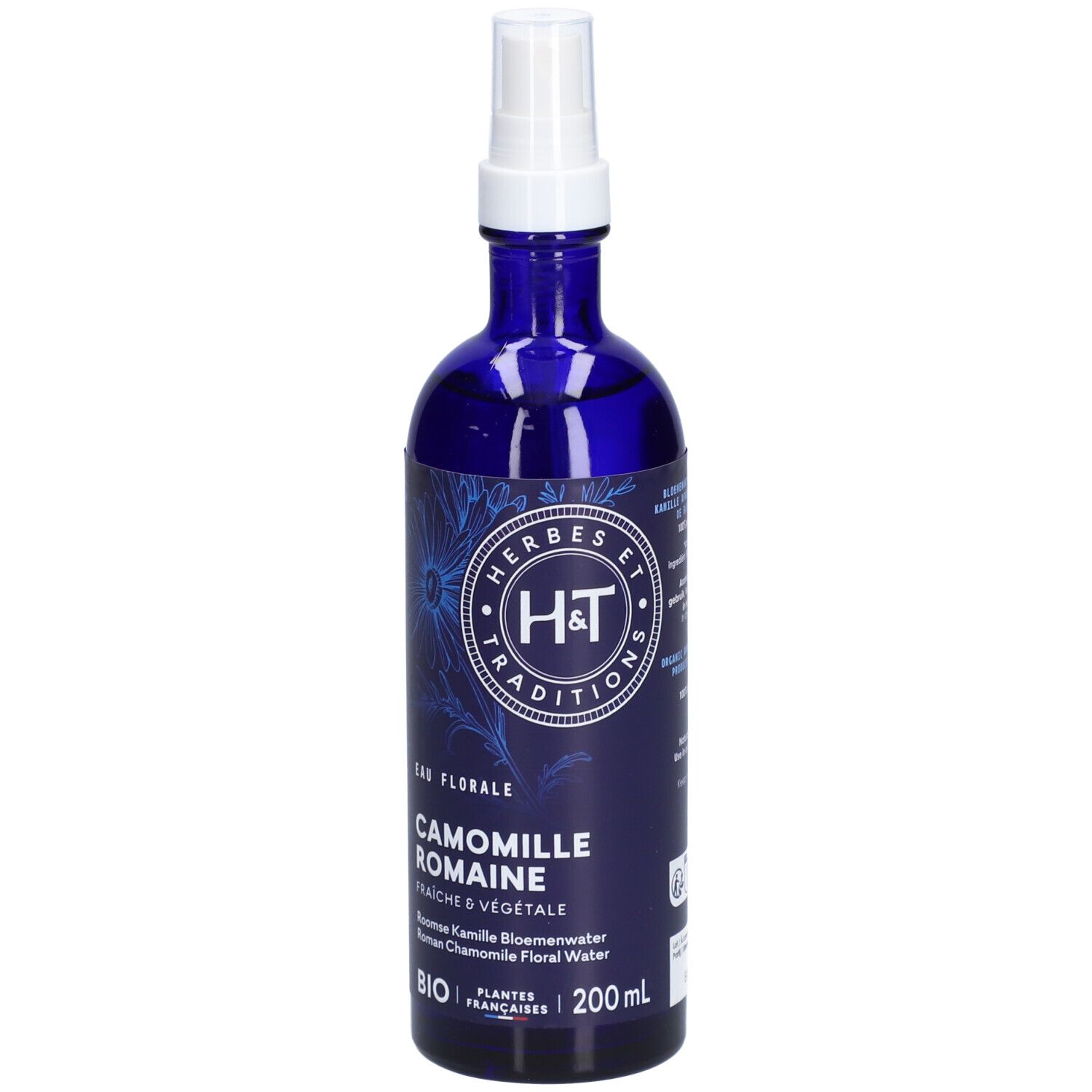 Flacon bleu avec vaporisateur blanc. Inscription: H&T, Camomille Romaine, 200 ml. Certification Bio.
