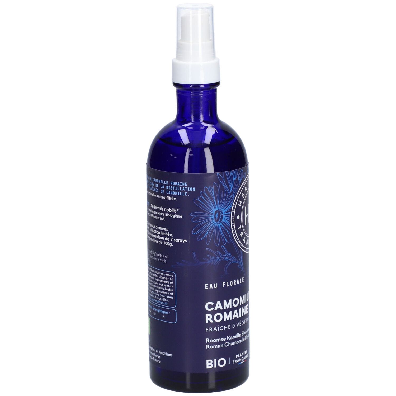 Flacon bleu avec vaporisateur blanc. Inscription: Eau Florale, Camomille Romaine, Bio. Texte au dos.