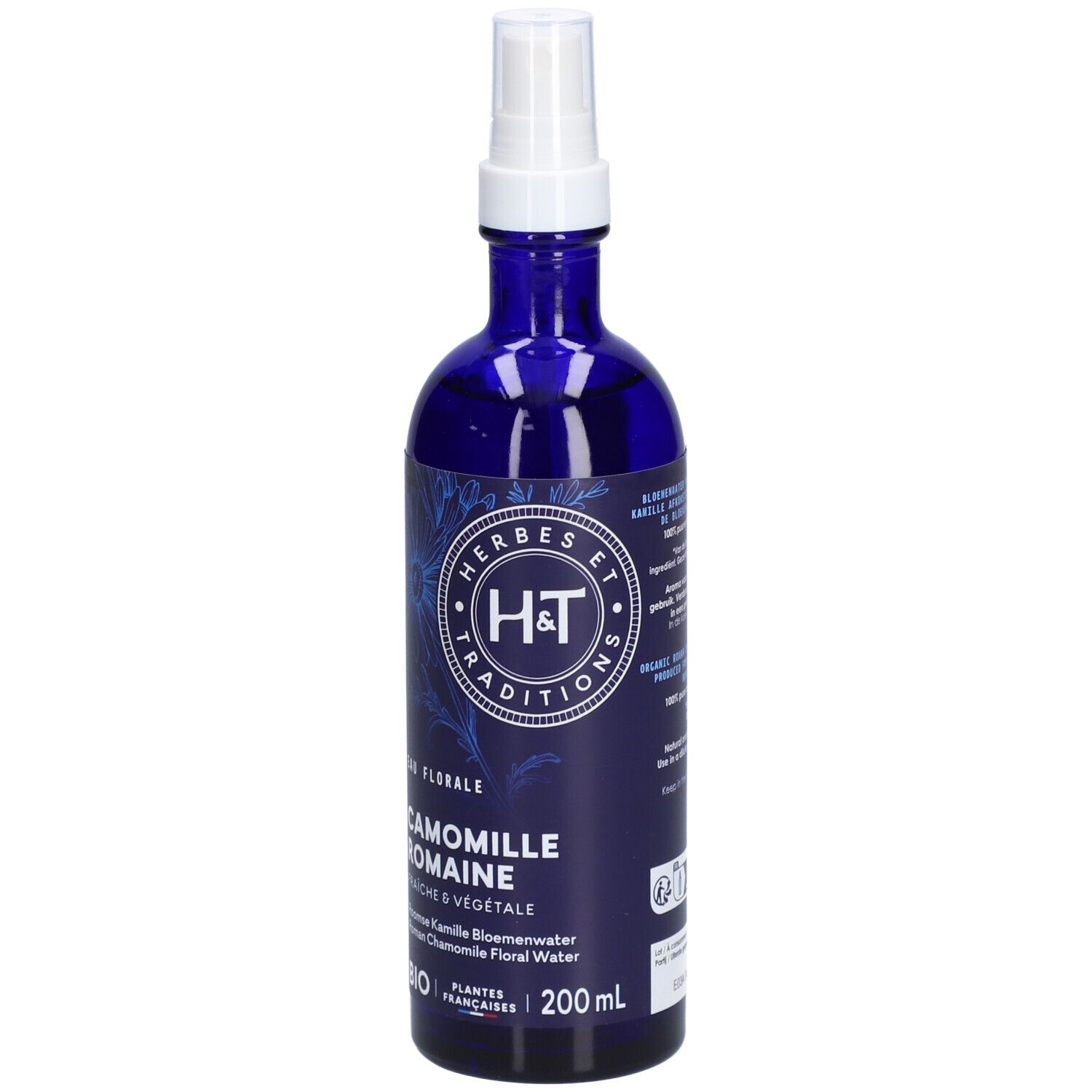 Flacon bleu avec vaporisateur blanc. Inscription: H&T, Camomille Romaine, 200 ml. Certification Bio.