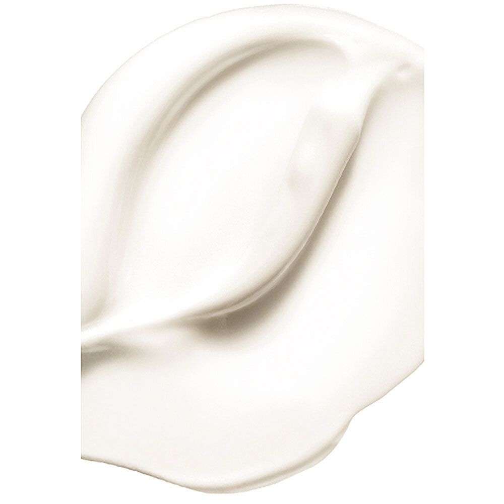 Gros plan d'une crème blanche. Texture lisse.