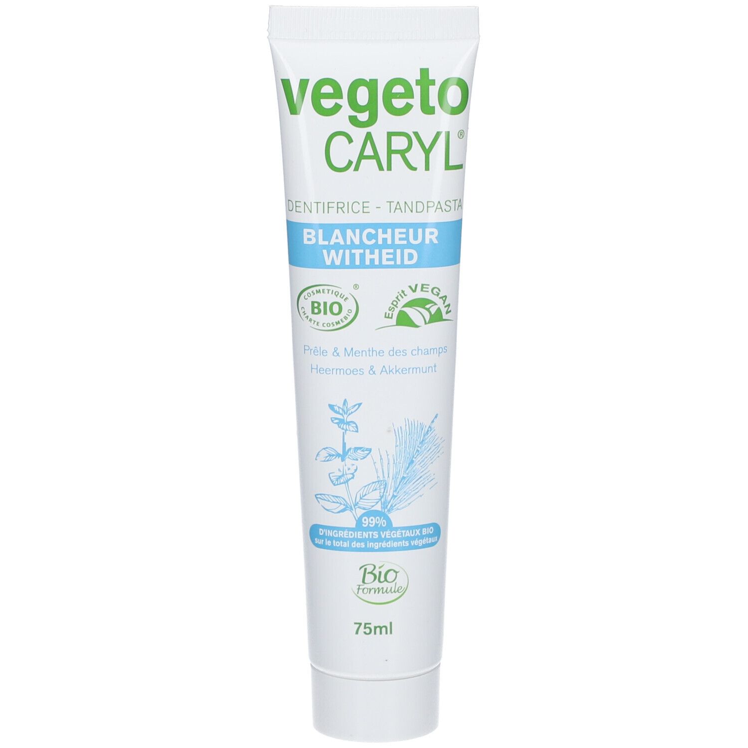 Tube de dentifrice blanche avec texte vert et bleu. "vegeto CARYL" et "Blancheur Withied" sont visibles.