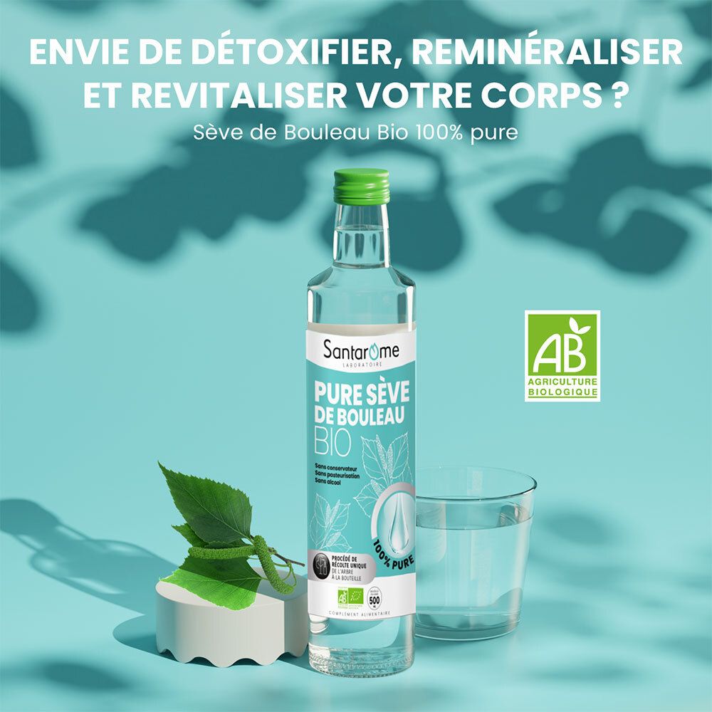 Bouteille en verre, verre et feuilles. Texte: Pure Sève de Bouleau BIO. Label bio.