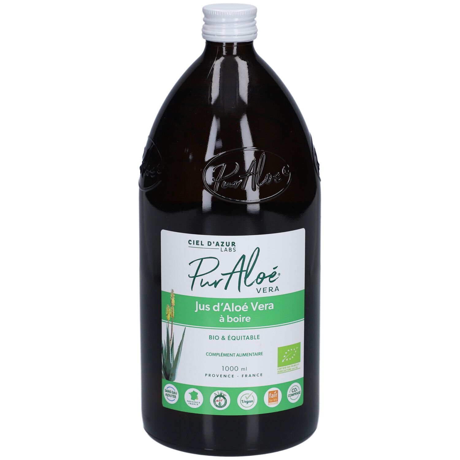 Bouteille en verre brun avec bouchon blanc. Étiquette : PurAloé Vera, Jus d'Aloé Vera à boire. Certification bio.